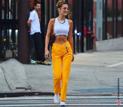 Bella Hadid wearing yellow trousers