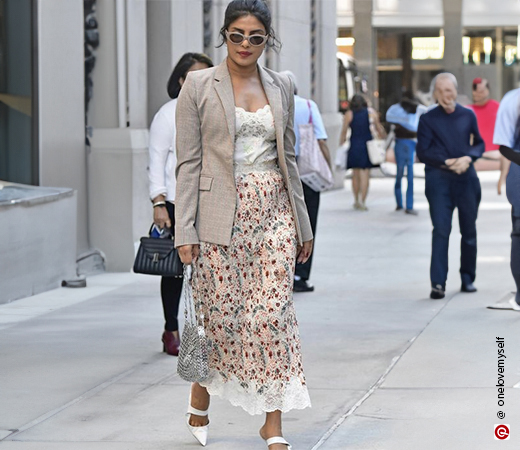  Priyanka Chopra wearing a skirt with a blazer
