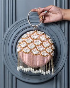 THE TAN CLAN Irsa Hand Embroidered Clutch with Tassels
