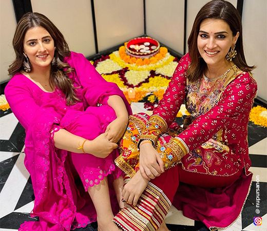 Nupur and Kriti Sanon wearing pink salwar suits