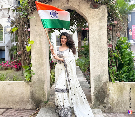 Actor Nimrat Kaur in a white salwar suit