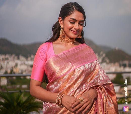 Mrunal Thakur wearing a pink Kanjivaram saree