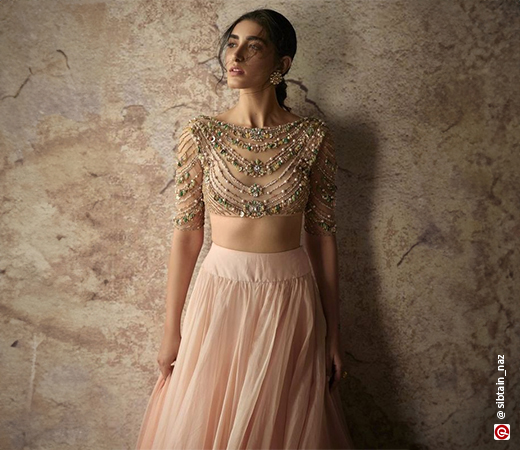 woman in dusty pink lehenga