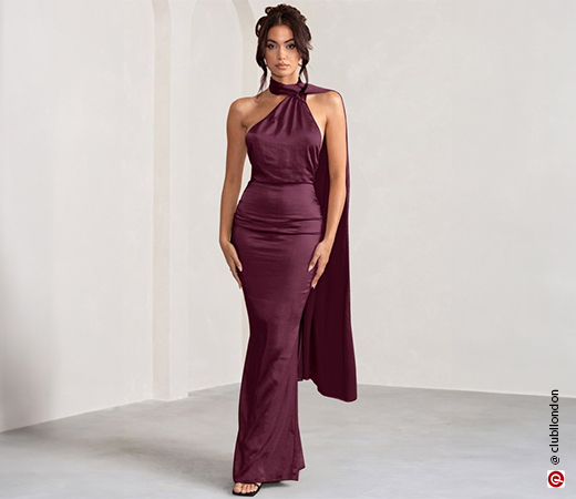 woman in an off-shoulder plum dress