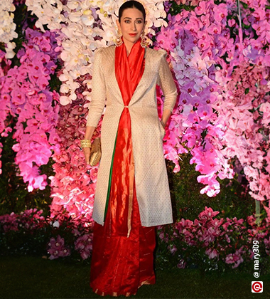  Karishma Kapoor wearing a saree with a long jacket
