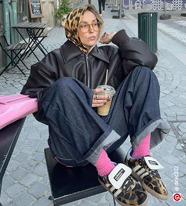 woman wearing a printed scarf
